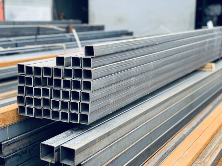 Rectangular metal profile pipe in bundles at a metal products warehouse